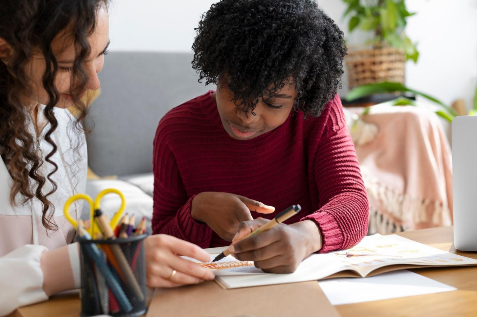 Designer reviewing interface hierarchy and user flow documentation