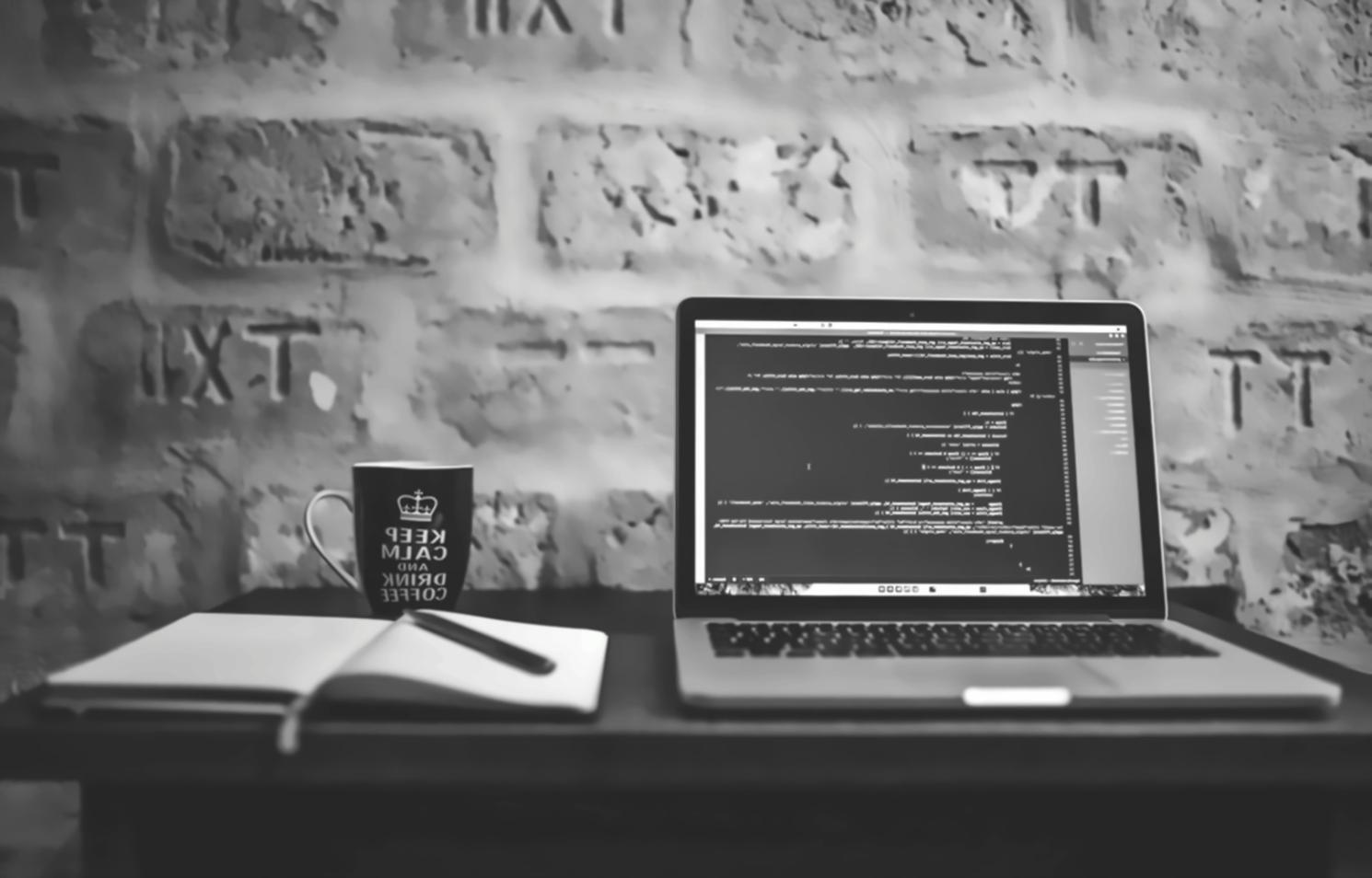 Students collaborating on interface design projects in workshop setting